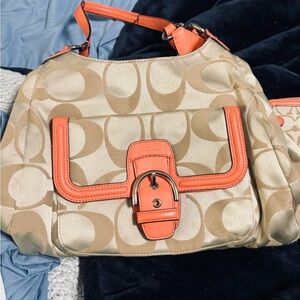 Used Coach bag with matching wallet.